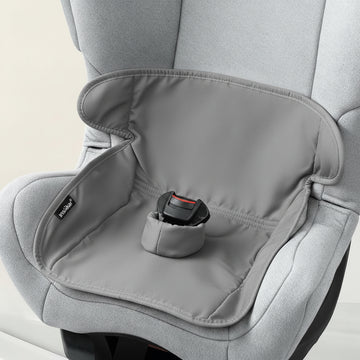 A grey car seat liner cover with a built-in cup holder, shown fitted over a gray car seat.