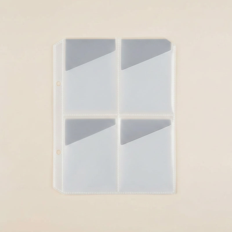 clear plastic sheet with multiple compartments on a beige background