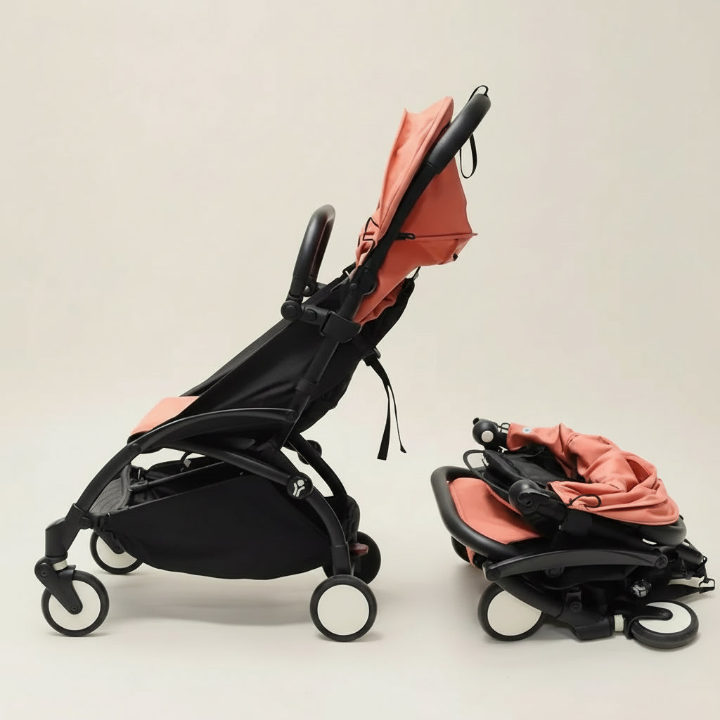 Foldable stroller with black frame and coral canopy on a white background