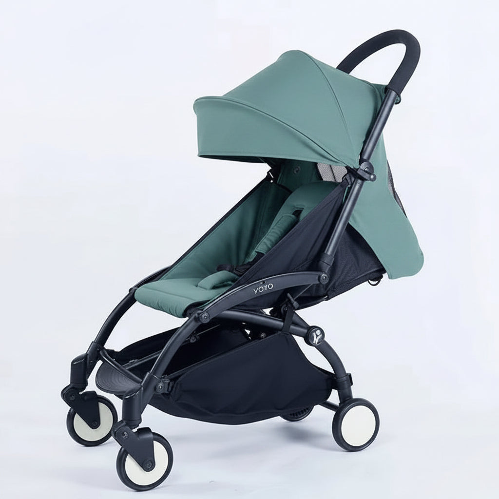 aqua and black stroller on a white background