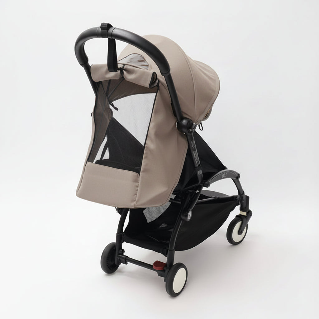toffee baby stroller with black frame on a white background