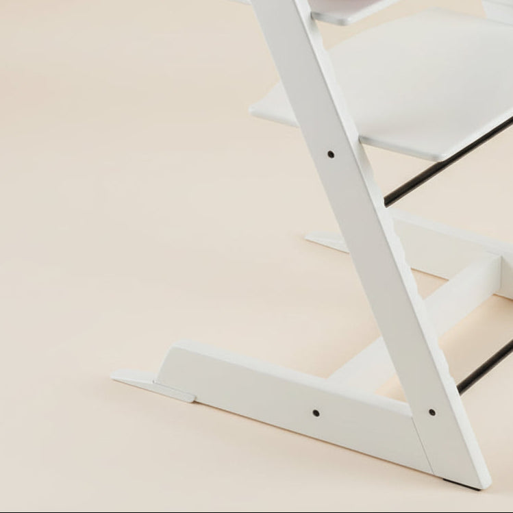 Wooden high chair on a white background